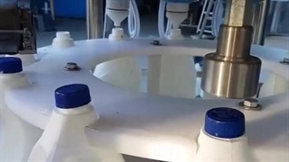 دستگاه پرکن جوهر نمک و مایعات اسیدی توان صنعت / 09152000050