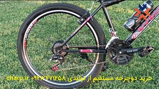 دوچرخه سایز 26 دنده کلاجدار طرح ویوا رنگ مشکی برچسب قرمز