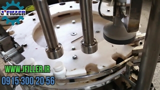 دستگاه پرکن گریس روتاری تک نازل اتوماتیک همراه با سینی تفلونی و دربگذار و دربند