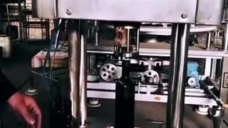 دستگاه دربند نیمه اتوماتیک پلیفرپروفشیشه روغن زیتون توان صنعت | 09152000050